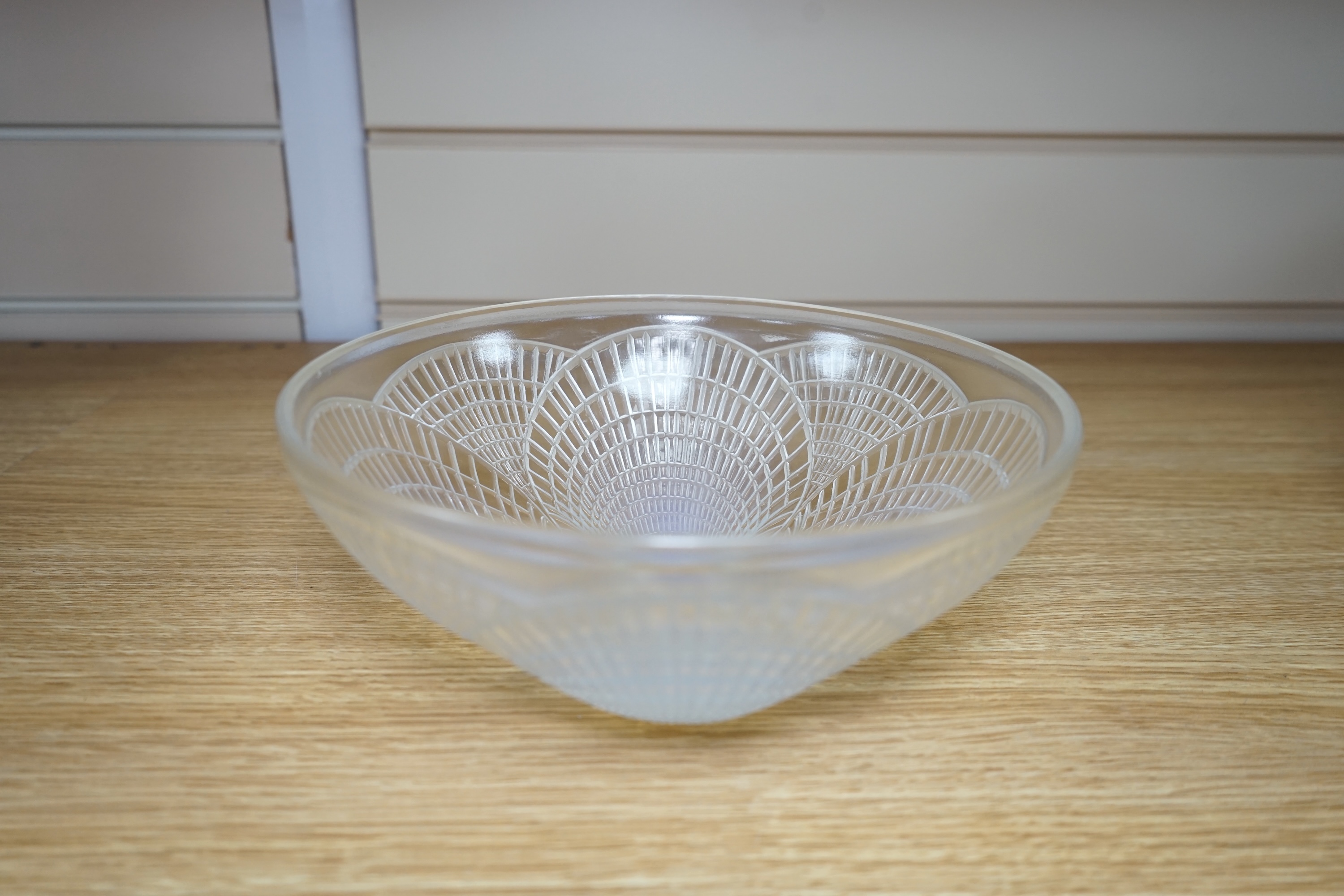 An R. Lalique coquille pattern glass bowl, no.3201, 21cm diameter. Condition - wear to base as expected, otherwise good